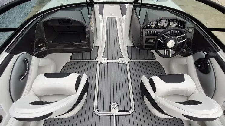 Slide: The Image of 2025 Monterey 224FS boat interior with sleek design and modern dashboard. - 10