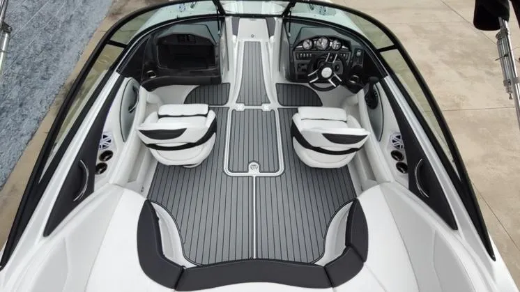 Slide: The Image of 2025 Monterey 224FS boat interior with sleek seating and modern dashboard. - 11