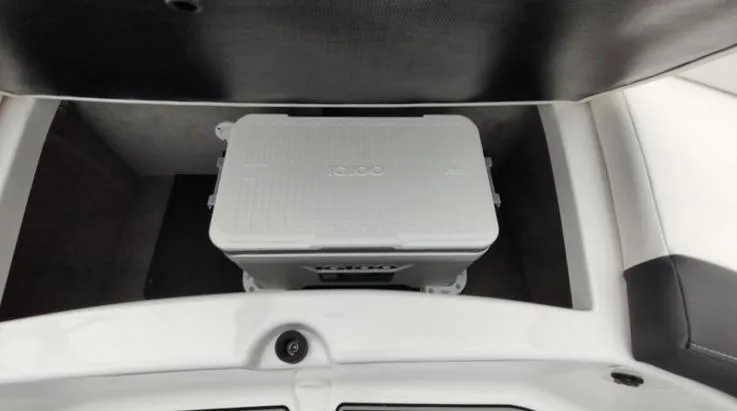 Slide: The Image of Storage compartment in 2025 Monterey 224FS boat with cooler. - 19