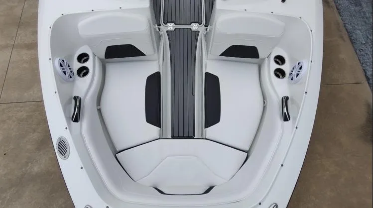 Slide: The Image of 2025 Monterey 224FS boat interior with sleek seating and modern design. - 4