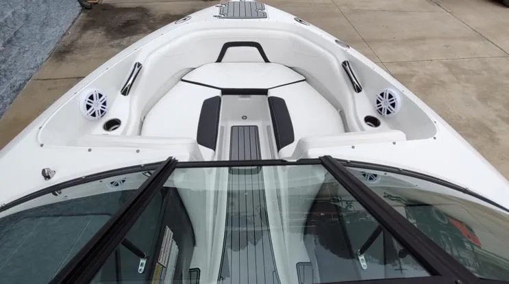 Slide: The Image of 2025 Monterey 224FS boat interior with sleek seating and modern design. - 5