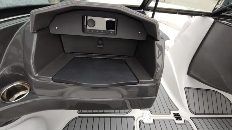 Slide: The Image of 2025 Monterey 224FS boat interior with sleek dashboard and modern controls. - 9