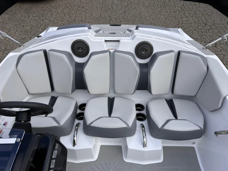 Slide: The Image of 2025 Scarab 165 SE boat interior with modern seating and built-in speakers. - 15
