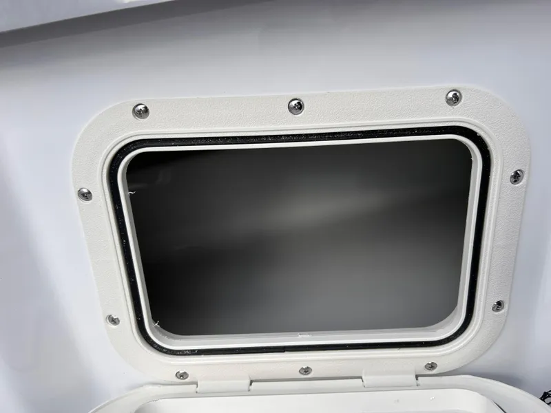 Slide: The Image of 2025 Scarab 165 SE boat hatch with secure, sleek design. - 27