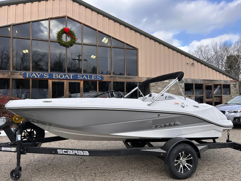 Slide: The Image of 2025 Scarab 165 SE boat on trailer at Fay's Boat Sales. - 9