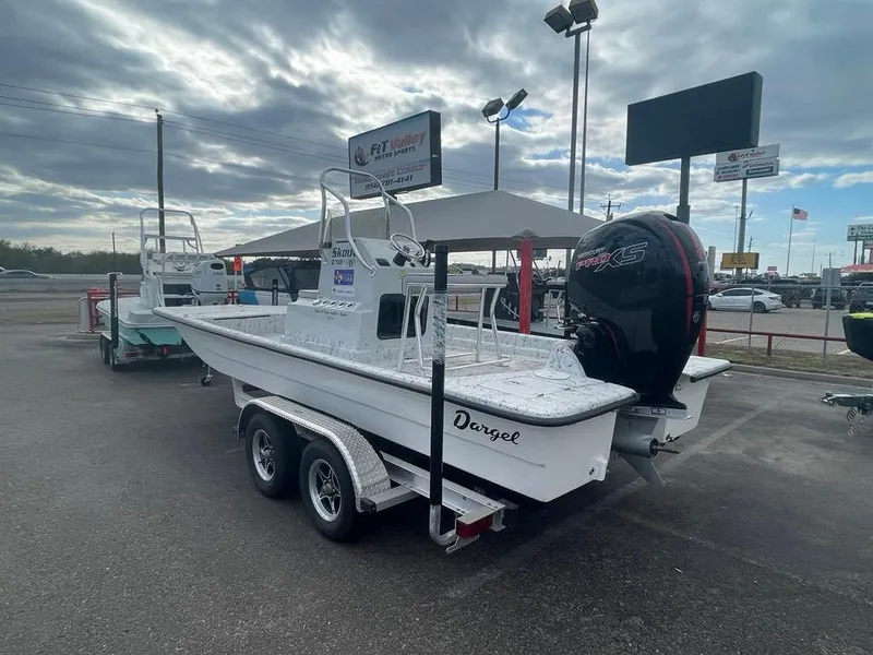Slide: The Image of 2024 Dargel Skout 210 boat on trailer in outdoor dealership lot. - 5
