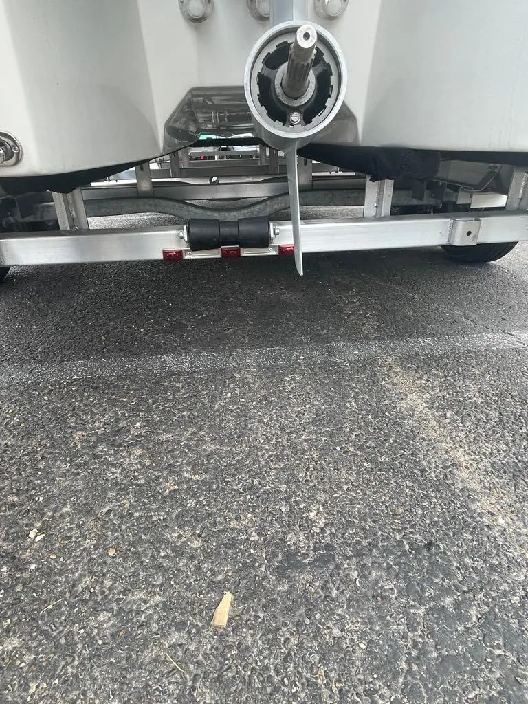 Slide: The Image of 2024 Dargel Skout 210 boat trailer hitch and propeller detail. - 6