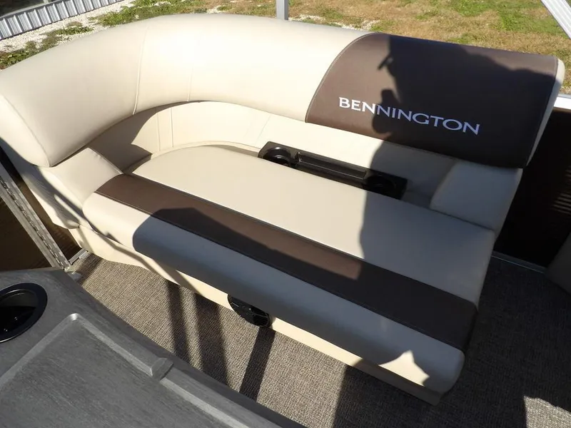 Slide: The Image of 2025 Bennington S Quad Bench 21 SSR boat seat with beige and brown upholstery. - 30
