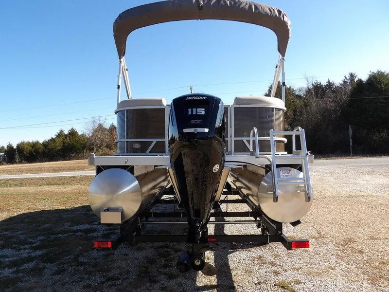 Slide: The Image of 2025 Bennington S Quad Bench 21 SSR pontoon boat with Mercury 115 engine. - 7