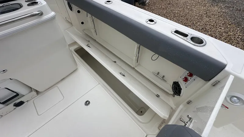 Slide: The Image of 2025 Boston Whaler 280 Outrage boat interior storage compartment. - 13