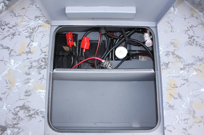 Slide: The Image of Boat battery compartment of 2025 Excel Eclipse 1554 with wiring and connectors. - 15