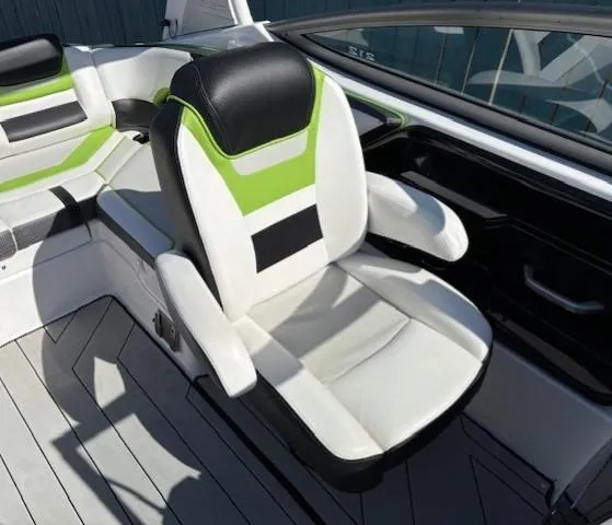 Slide: The Image of 2021 Yamaha Boats 212XE interior with stylish seating and modern design. - 16