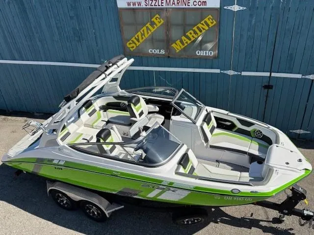 Slide: The Image of 2021 Yamaha Boats 212XE in green and white, displayed at Sizzle Marine, Ohio. - 6