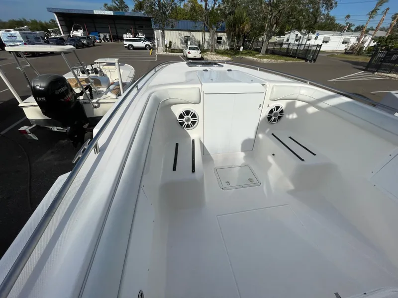 Slide: The Image of 1997 Wellcraft 302 boat interior with spacious deck and modern features. - 35
