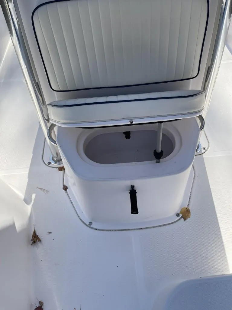 Slide: The Image of 2009 Pro-Line 23 Bay boat seat with storage compartment. - 11