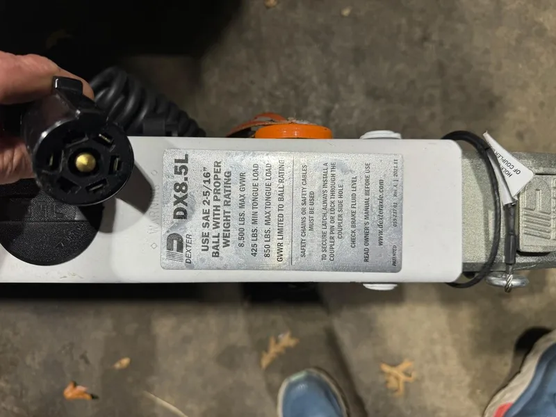 Slide: The Image of Close-up of a Supreme S220 2024 trailer hitch with safety and usage instructions. - 29