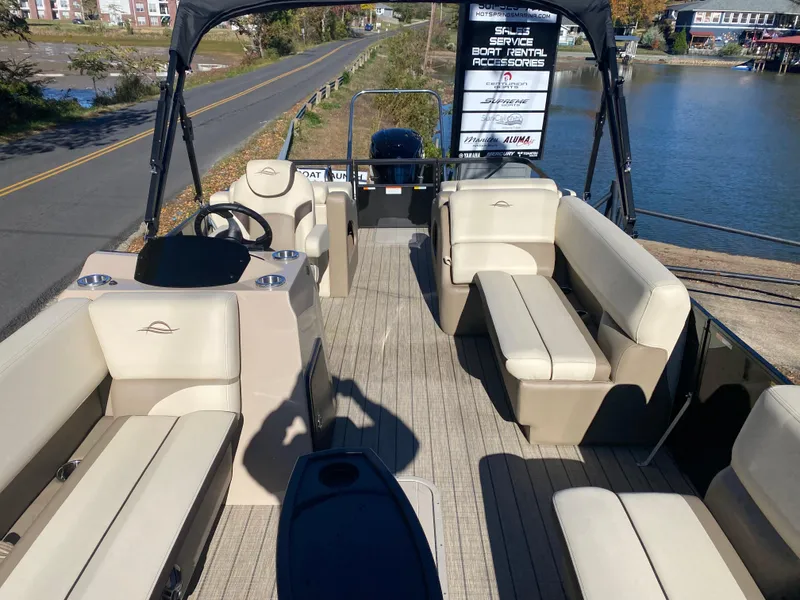 Slide: The Image of 2025 SunCatcher Select 324SS pontoon boat with spacious seating and modern design. - 18