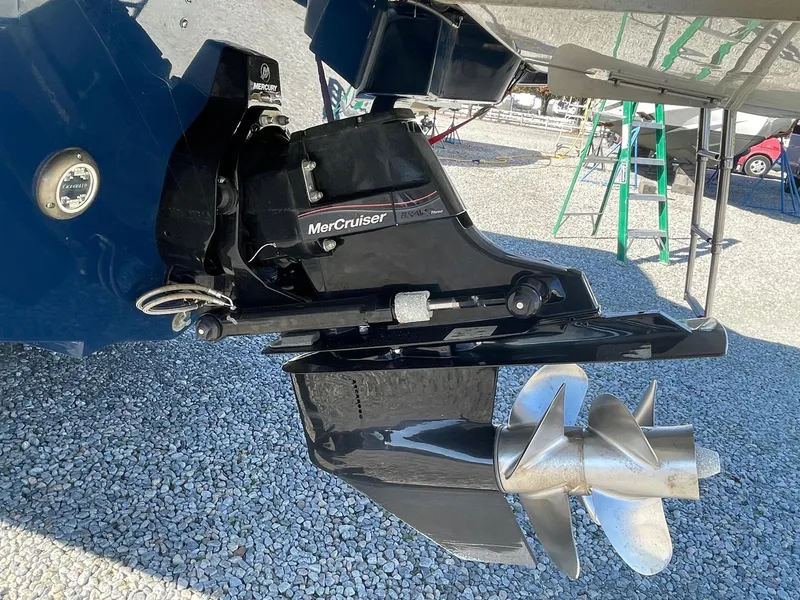 Slide: The Image of MerCruiser engine on 2022 Sea Ray SLX 280 boat, displayed on gravel surface. - 3