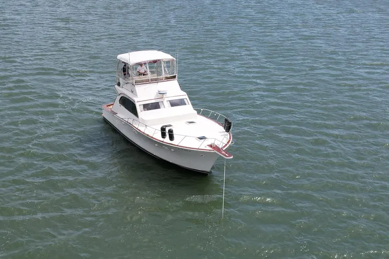 Slide: The Image of 1981 Post 46 Sportfish boat on open water. - 9