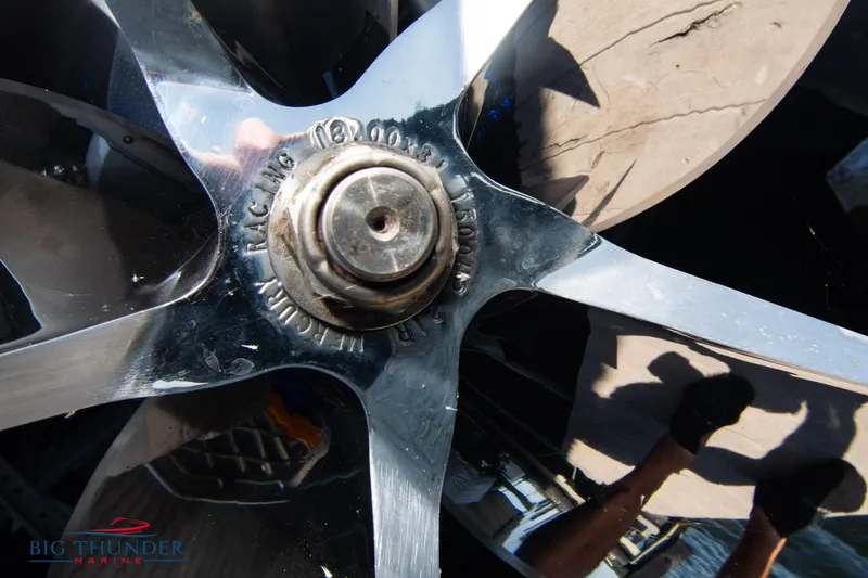 Slide: The Image of Close-up of a 2007 Cigarette 42X boat propeller with reflective metallic finish. - 10