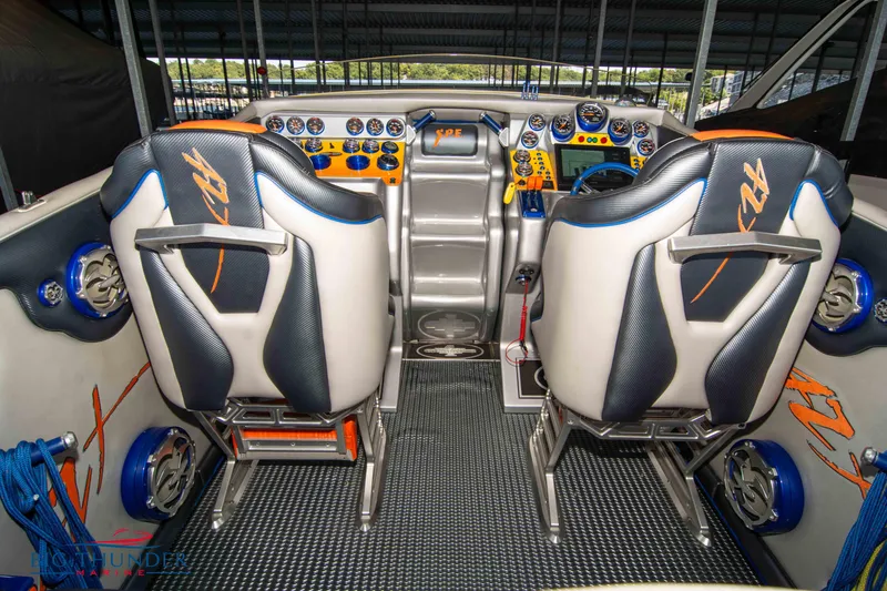 Slide: The Image of 2007 Cigarette 42X boat cockpit with dual seats and advanced control panel. - 15