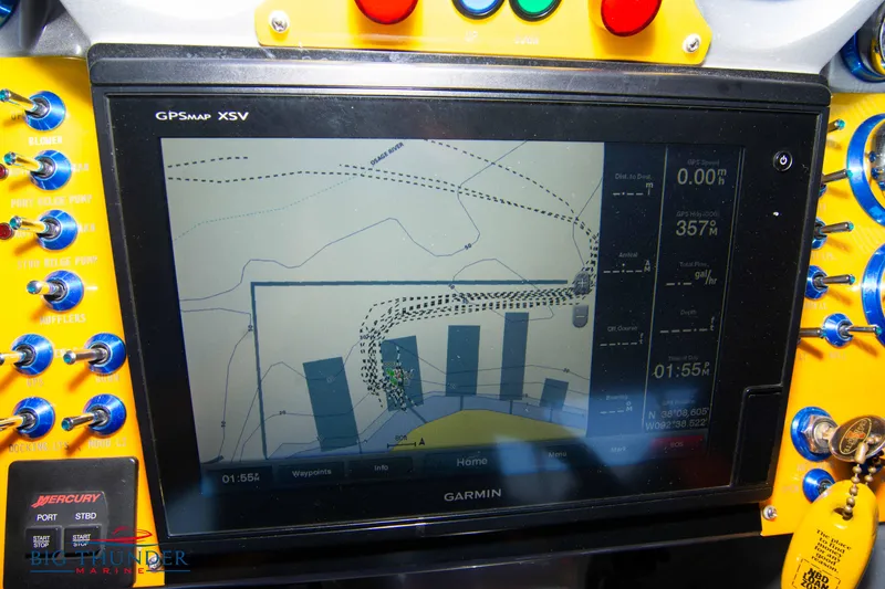 Slide: The Image of Garmin GPS display on 2007 Cigarette 42X boat dashboard with navigation data. - 25
