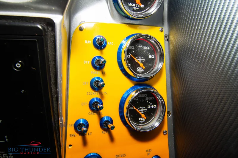 Slide: The Image of Dashboard of 2007 Cigarette 42X with gauges and switches. - 29