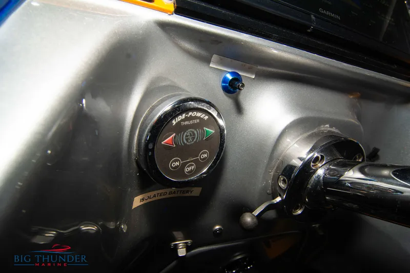 Slide: The Image of Close-up of 2007 Cigarette 42X boat dashboard with Side-Power thruster control. - 32
