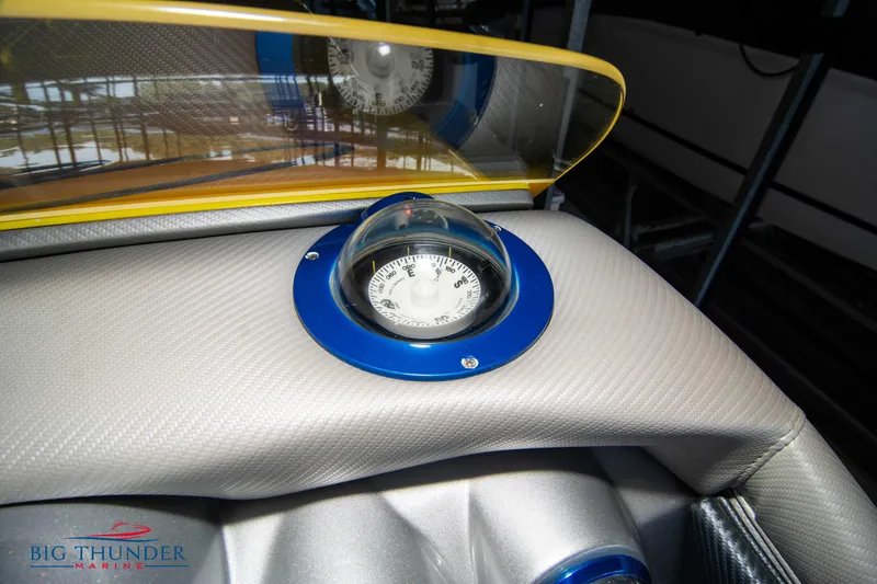 Slide: The Image of 2007 Cigarette 42X boat dashboard with compass and windshield. - 33