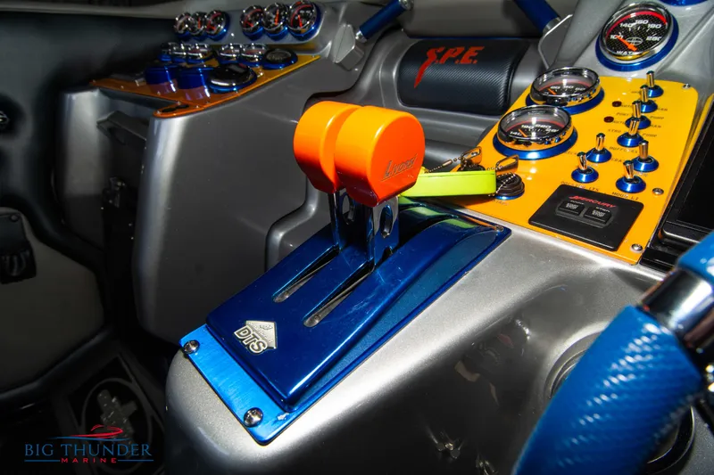 Slide: The Image of 2007 Cigarette 42X boat cockpit with vibrant controls and gauges. - 37