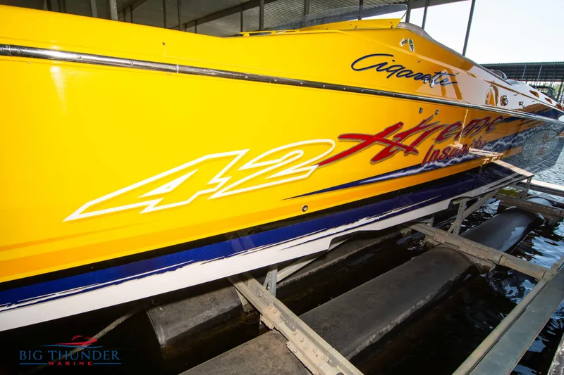 Slide: The Image of Yellow 2007 Cigarette 42X speedboat on a lift at Big Thunder Marine. - 4