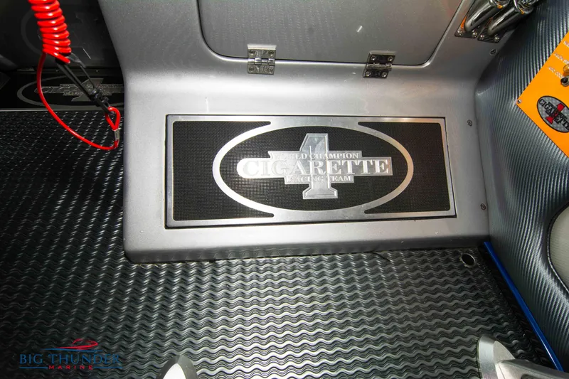 Slide: The Image of 2007 Cigarette 42X boat interior with branded floor mat. - 42