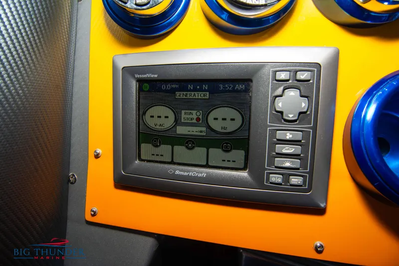 Slide: The Image of SmartCraft VesselView display on 2007 Cigarette 42X dashboard with carbon fiber accents. - 46