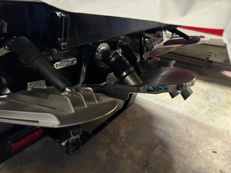 Slide: The Image of Close-up of 2024 Supreme S240 boat's advanced propulsion system and components. - 35