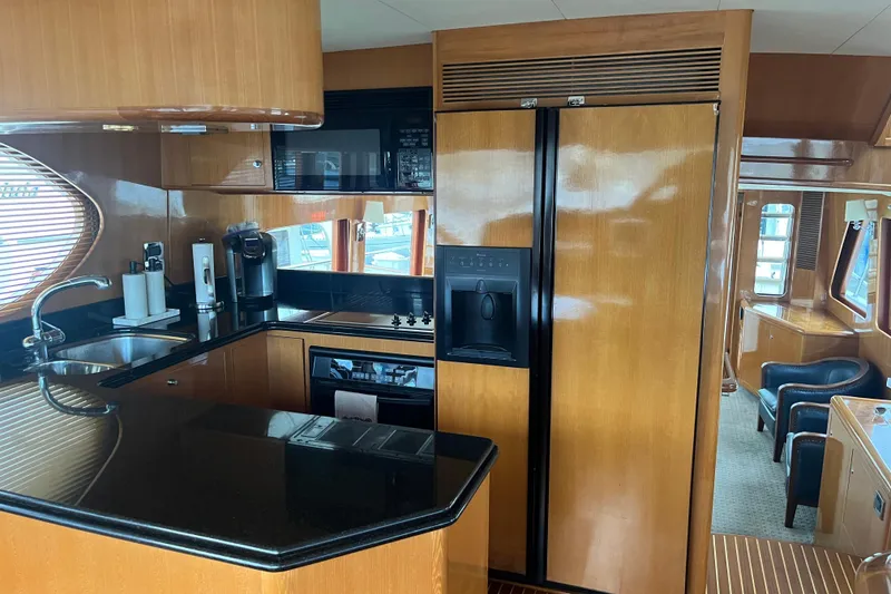 Slide: The Image of Luxurious kitchen interior of 2004 Ocean Alexander 64 Pilothouse yacht with modern amenities. - 3