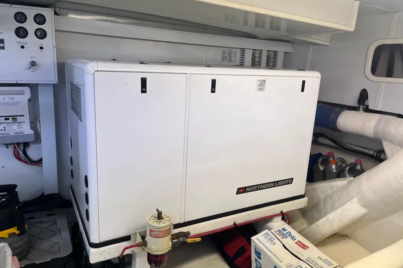 Slide: The Image of Engine room of 2004 Ocean Alexander 64 Pilothouse with Northern Lights generator. - 42