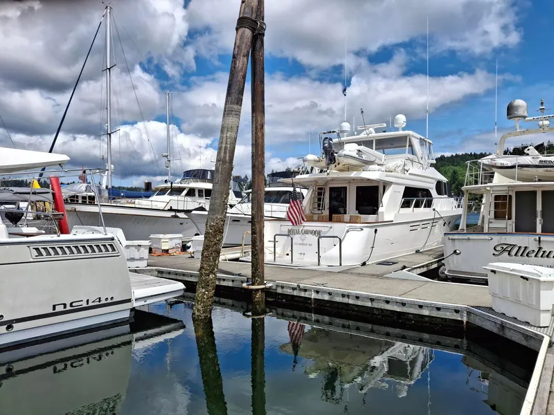 Slide: The Image of Docked 2004 Ocean Alexander 64 Pilothouse yacht under cloudy sky. - 48