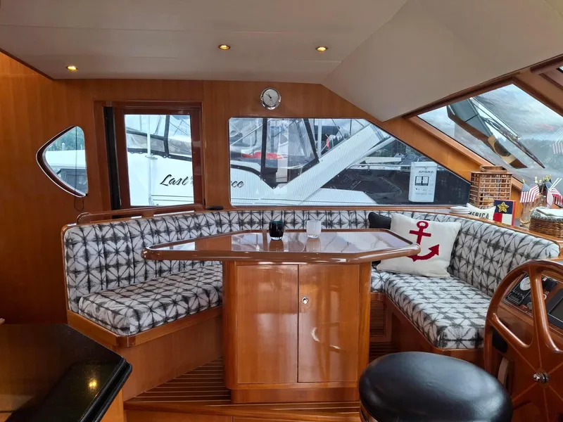 Slide: The Image of Luxurious interior of 2004 Ocean Alexander 64 Pilothouse yacht with elegant seating and decor. - 6