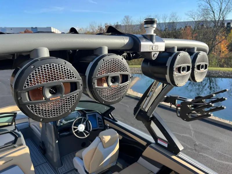 Slide: The Image of 2024 MasterCraft XStar S boat with premium audio speakers and sleek interior design. - 16
