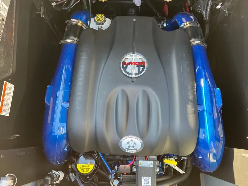 Slide: The Image of 2024 MasterCraft XStar S engine with blue accents and Ilmor branding. - 19