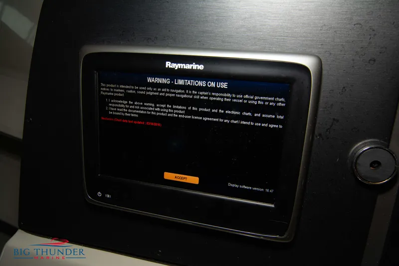 Slide: The Image of Raymarine display on 2016 Sea Ray 370 Sundancer with warning message. - 23