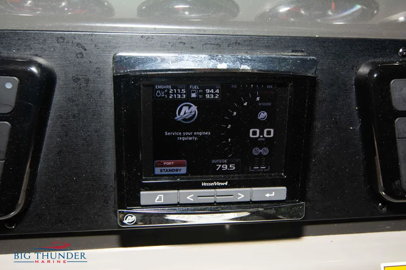 Slide: The Image of Dashboard display of a 2016 Sea Ray 370 Sundancer boat, showing engine and fuel data. - 27