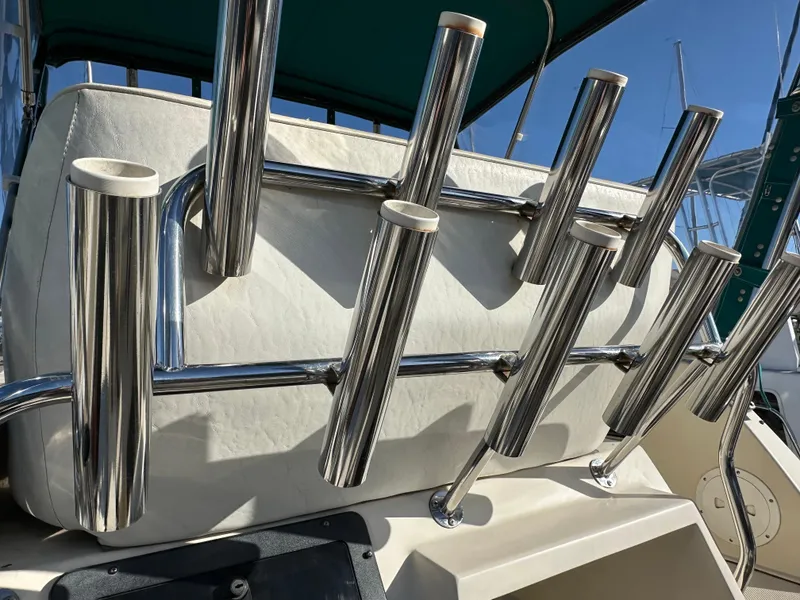 Slide: The Image of Stainless steel rod holders on 1994 Precision 28 Convertible boat deck. - 11