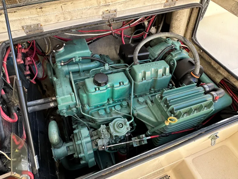 Slide: The Image of Engine of 1994 Precision 28 Convertible boat, showcasing intricate mechanical details. - 16