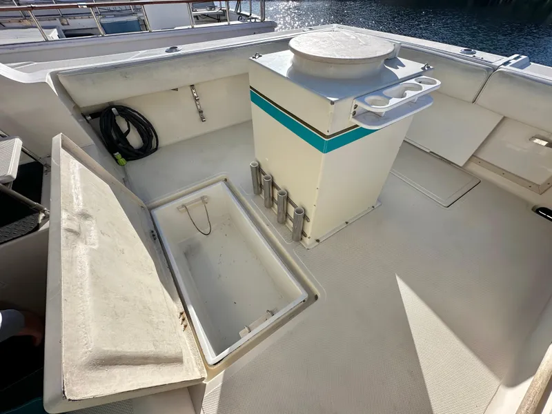 Slide: The Image of 1994 Precision 28 Convertible boat deck with storage compartments and equipment. - 6