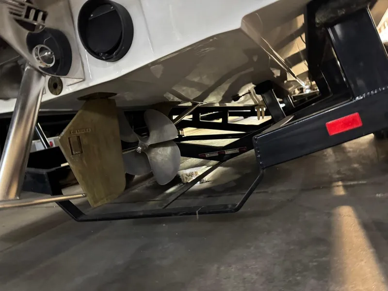 Slide: The Image of 2015 Malibu Wakesetter 22 MXZ boat propeller and trailer detail. - 19