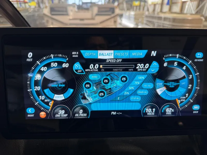 Slide: The Image of Dashboard display of 2015 Malibu Wakesetter 22 MXZ boat, showing speed and engine metrics. - 35