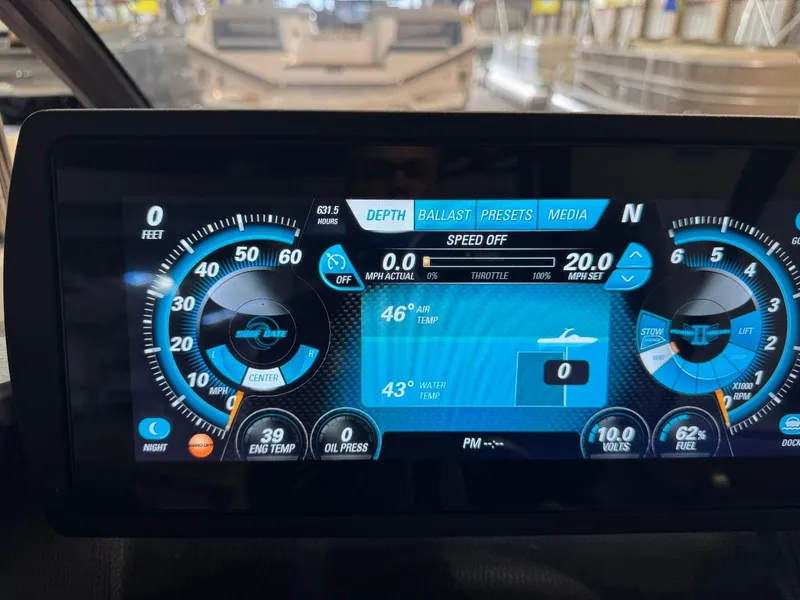 Slide: The Image of Dashboard of 2015 Malibu Wakesetter 22 MXZ boat, displaying speed and engine metrics. - 37