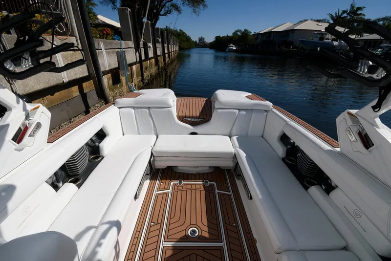 Slide: The Image of 2017 Nautique Super Air Nautique G25 storage compartment on teak deck. - 10