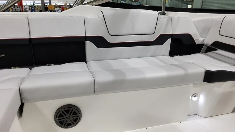Slide: The Image of 2025 Formula 290 Bowrider interior seating with sleek white and black design. - 8